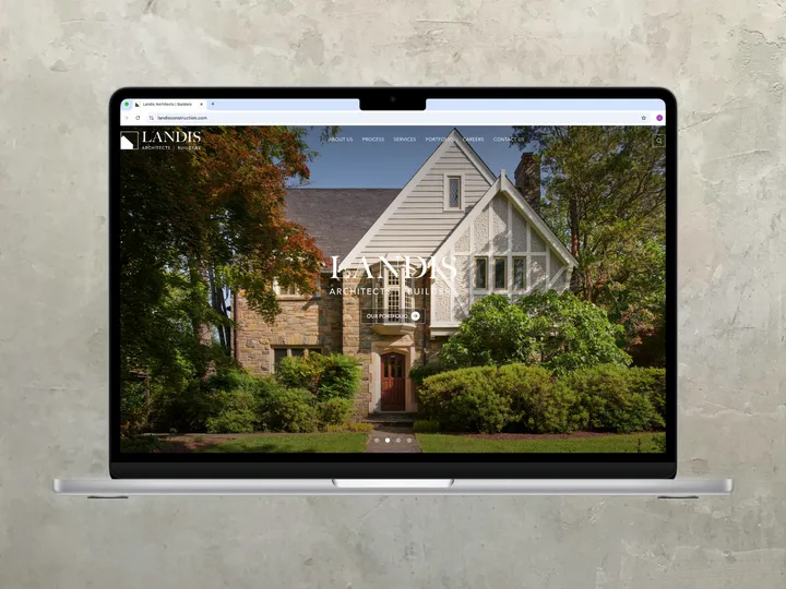 Laptop view of Landis Architects & Builders project portfolio page