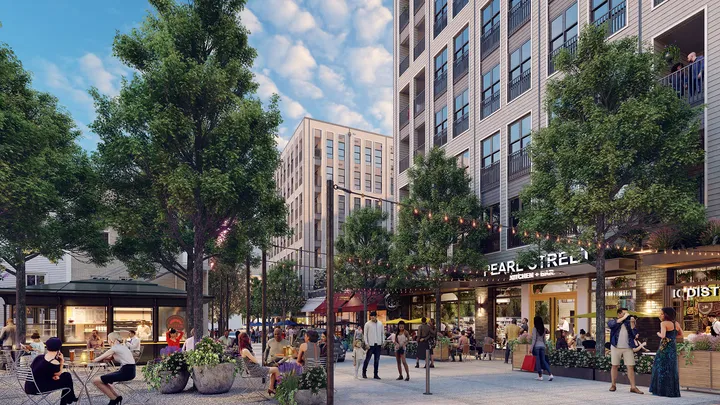 Evening view of Porter House area with lighting and pedestrian paths