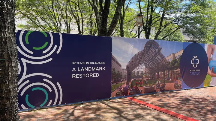 Close-up of pavilion banner showing detailed architectural rendering