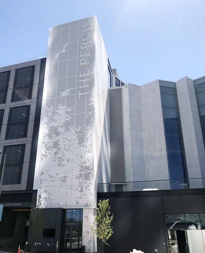 The Perch exterior branding application on building facade with large-scale graphics