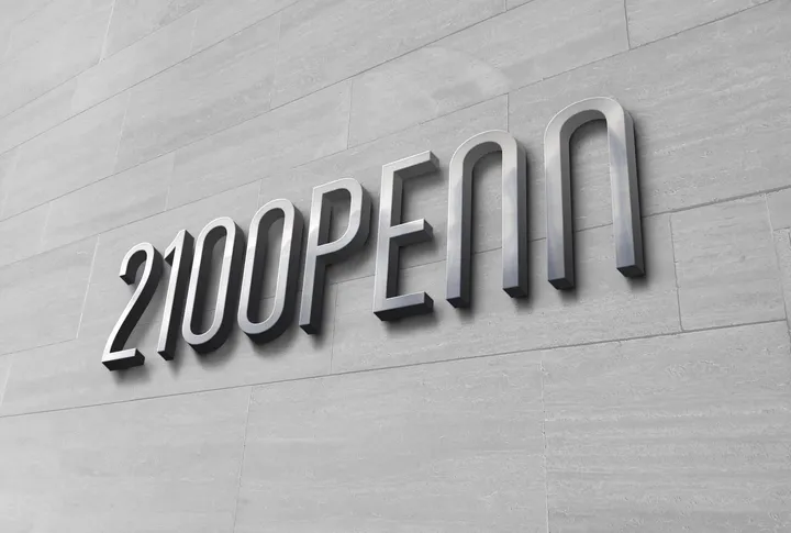 3D wall logo mockup showing dimensional application of 2100 Penn identity