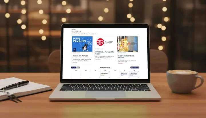 The events calendar on a laptop: featured event cards above the live month grid.