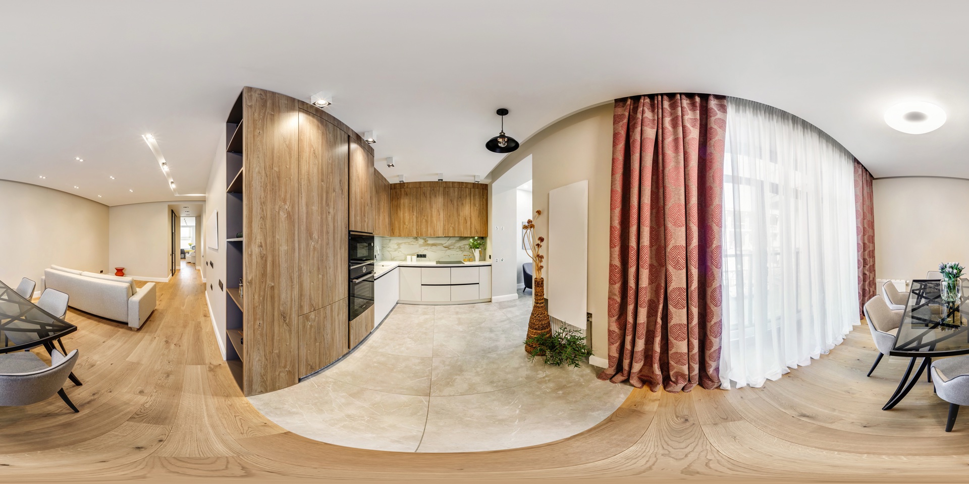 An equirectangular 360-degree panorama of an interior space